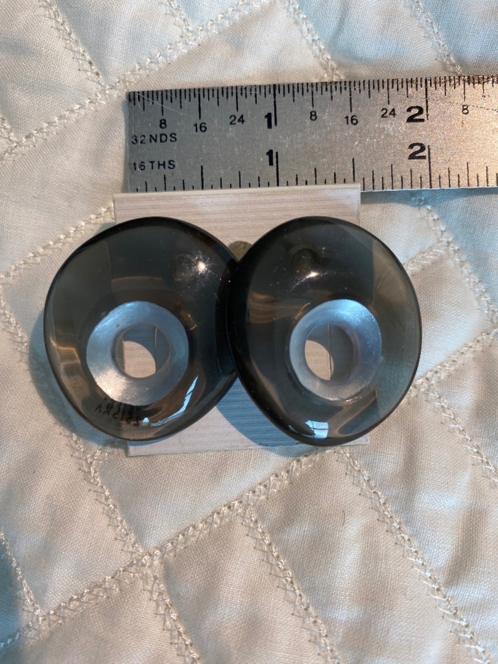 A PAIR OF TRANSLUCENT GREY WITH A SILVER CENTER ZSISKA EARRINGS